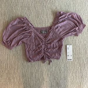 urban outfitters purple crop top.